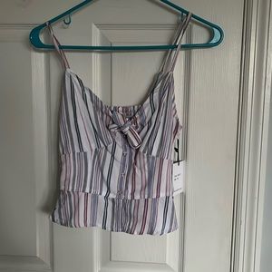 Tank top from japna it’s an xs. Cropped and is red white and blue stripes.